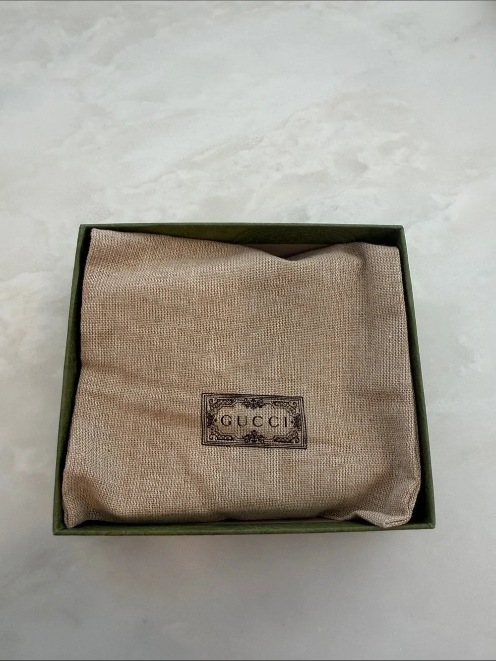 Gucci Black Leather Bi-Fold Wallet with Subtle GG Emblem
